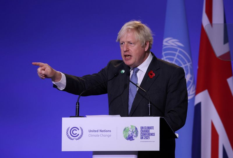 &copy; Reuters. FILE PHOTO: Britain's Prime Minister Boris Johnson delivers a speech during the opening ceremony of the UN Climate Change Conference (COP26) in Glasgow, Scotland, Britain, November 1, 2021. REUTERS/Yves Herman/Pool/File Photo