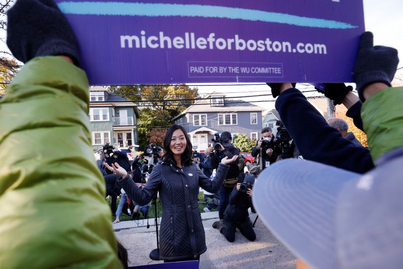 &copy; Reuters. Michelle Wu, candidate for Mayor of Boston, greets supporters after casting her ballot in her bid to become the first woman and first person of color to hold the office, in Boston, Massachusetts, U.S., November 2, 2021.   REUTERS/Brian Snyder