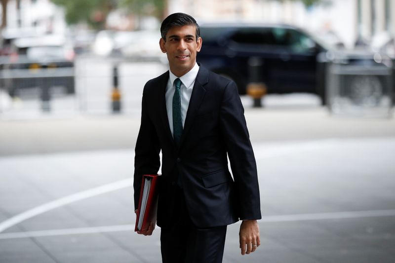 &copy; Reuters. FILE PHOTO: Britain's Chancellor of the Exchequer Rishi Sunak arrives at Broadcasting House to take part in an interview on BBC's 'The Andrew Marr Show', in London, Britain, October 24, 2021. REUTERS/Peter Nicholls