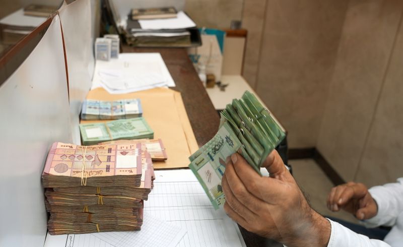Lebanese carry 'worthless' stacks of cash after currency crash