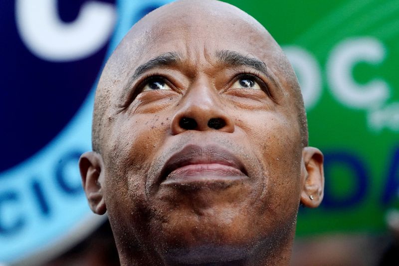 &copy; Reuters. FILE PHOTO: Democratic candidate for New York City Mayor Eric Adams attends a rally at City Hall the day before the election in the Manhattan borough of New York City, New York, U.S., November 1, 2021.  REUTERS/Carlo Allegri/File Photo