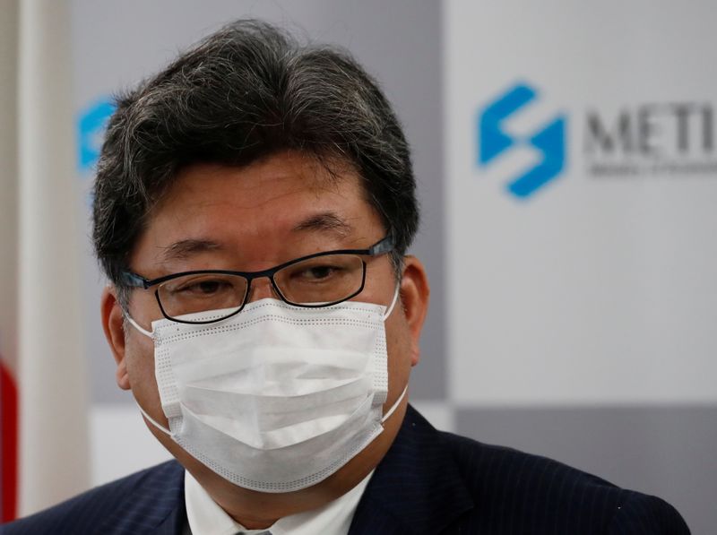 &copy; Reuters. FILE PHOTO: Japan's new Economy, Trade and Industry Minister Koichi Hagiuda wearing a protective mask amid the coronavirus disease (COVID-19) outbreak, speaks at a news conference in Tokyo, Japan, October 5, 2021. REUTERS/Kim Kyung-Hoon