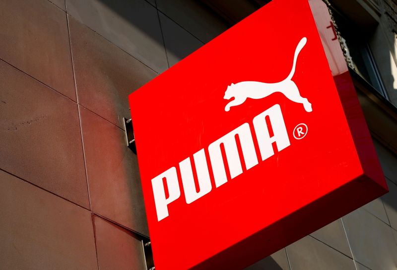 &copy; Reuters. FILE PHOTO: The logo of German sports goods firm Puma is seen at the entrance of one of its stores in Vienna, Austria, March 18, 2016.   REUTERS/Leonhard Foeger/File Photo