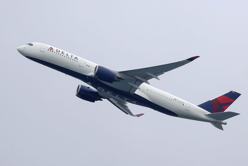 &copy; Reuters. FILE PHOTO: A Delta Air Lines Airbus A350-900 plane takes off from Sydney Airport in Sydney, Australia, October 28, 2020.  REUTERS/Loren Elliott