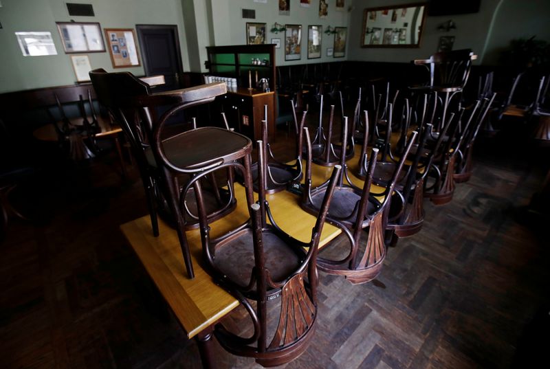&copy; Reuters. FILE PHOTO: Chairs are placed on tables as the Deminka pub remains closed due to the coronavirus disease (COVID-19) restrictions in Prague, Czech Republic, March 30, 2021. Picture taken March 30, 2021.   REUTERS/David W Cerny