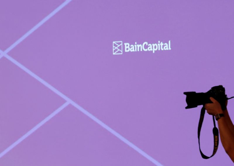 &copy; Reuters. FILE PHOTO: The logo of Bain Capital is displayed on the screen during a news conference in Tokyo, Japan October 5, 2017. REUTERS/Kim Kyung-Hoon