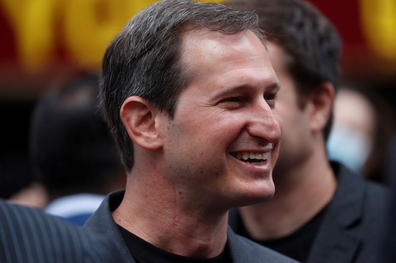 &copy; Reuters. FILE PHOTO: Jason Robins, CEO of DraftKings, smiles after the company's initial public offering (IPO) listing, outside the Nasdaq MarketSite, in New York City, U.S., June 11, 2021. REUTERS/Shannon Stapleton/File Photo