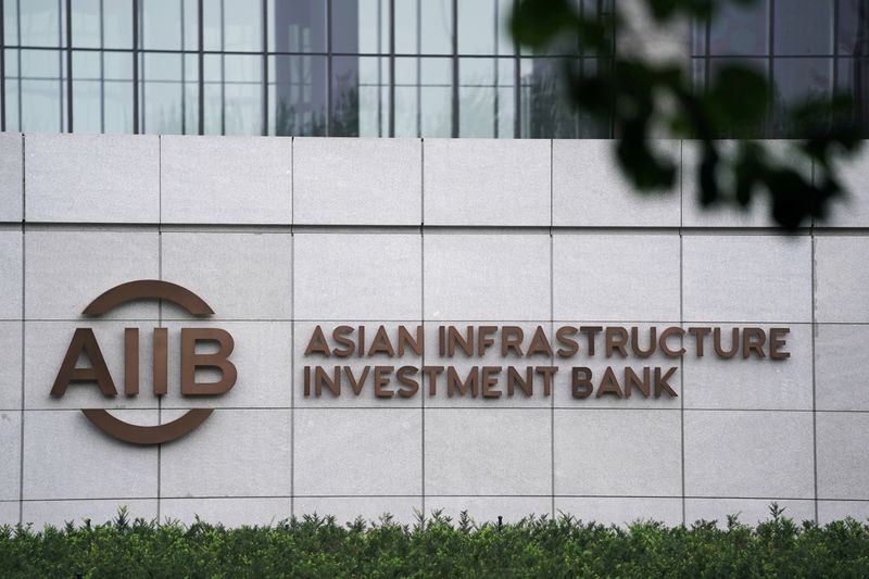 &copy; Reuters. FILE PHOTO: The sign of Asian Infrastructure Investment Bank (AIIB) is pictured at its headquarters in Beijing, China July 27, 2020. REUTERS/Tingshu Wang