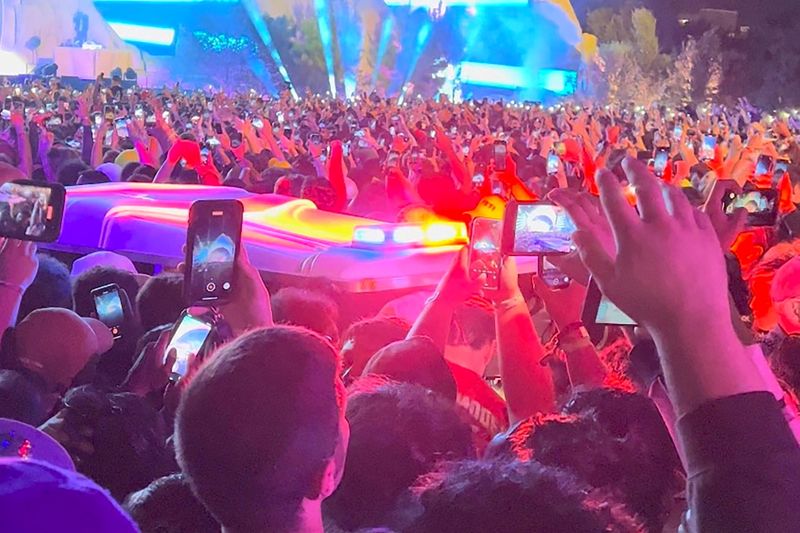 &copy; Reuters. An ambulance is seen in the crowd during the Astroworld music festiwal in Houston, Texas, U.S., November 5, 2021 in this still image obtained from a social media video on November 6, 2021. Courtesy of Twitter @ONACASELLA /via REUTERS 