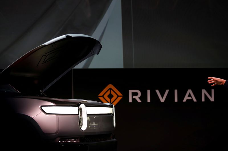 &copy; Reuters. FILE PHOTO: R.J. Scaringe, Rivian's 35-year-old CEO, introduces his company's R1T all-electric pickup truck at Los Angeles Auto Show in Los Angeles, California, U.S. November 27, 2018. REUTERS/Mike Blake/File Photo