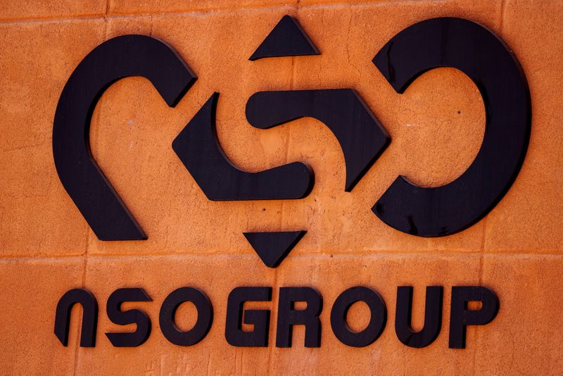 &copy; Reuters. FILE PHOTO: The logo of Israeli cyber firm NSO Group is seen at one of its branches in the Arava Desert, southern Israel July 22, 2021. REUTERS/Amir Cohen