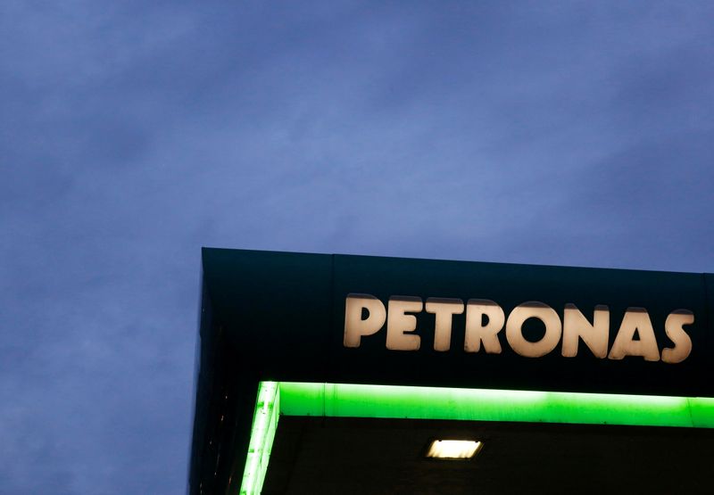 &copy; Reuters. FILE PHOTO: A logo of a Petronas fuel station is seen against a darkening sky in Kuala Lumpur, Malaysia February 10, 2016. To match Interview REUTERS/Olivia Harris