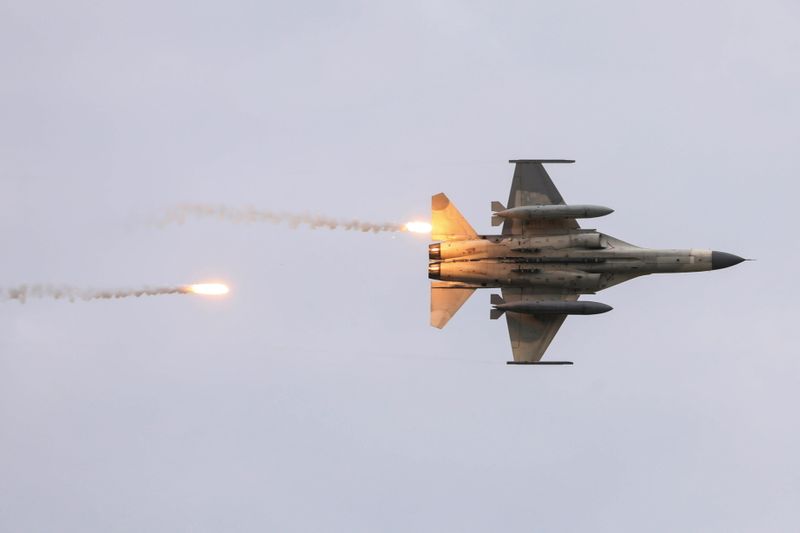 &copy; Reuters. FILE PHOTO: Taiwanese domestically built Indigenous Defense Fighters (IDF) take part in the live-fire, anti-landing Han Kuang military exercise, which simulates an enemy invasion, in Taichung, Taiwan July 16, 2020. REUTERS/Ann Wang