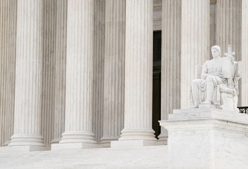 &copy; Reuters. FILE PHOTO: The Authority of Law statue is pictured outside the U.S. Supreme Court building as rulings are expected to be released today in Washington, D.C., U.S. June 25, 2021. REUTERS/Ken Cedeno/File Photo