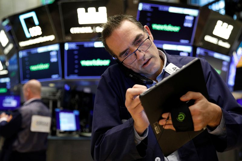 Wall Street declines, ending a run of record highs