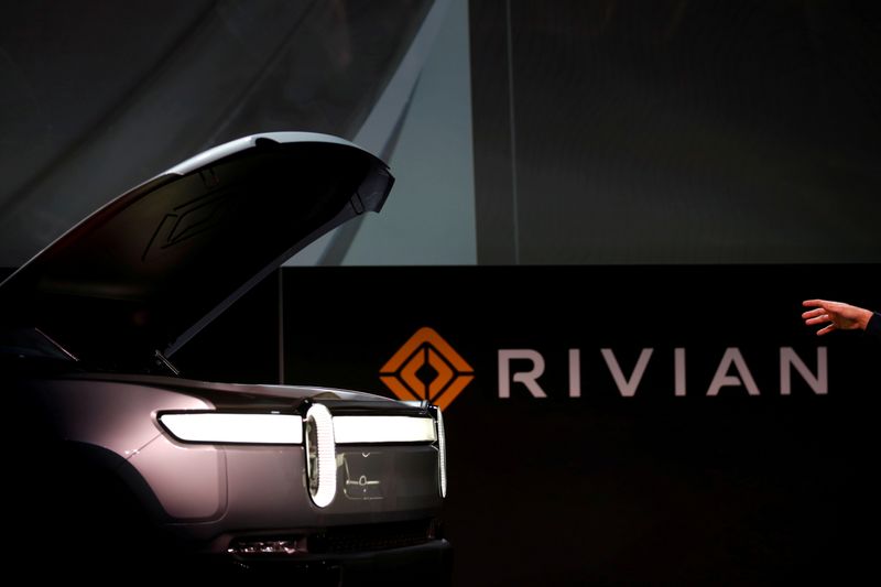 &copy; Reuters. FILE PHOTO: R.J. Scaringe, Rivian's 35-year-old CEO, introduces his company's R1T all-electric pickup truck at Los Angeles Auto Show in Los Angeles, California, U.S. November 27, 2018. REUTERS/Mike Blake/File Photo