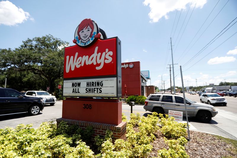 &copy; Reuters. FILE PHOTO: A Wendy?s restaurant displays a "Now Hiring" sign in Tampa, Florida, U.S., June 1, 2021.  REUTERS/Octavio Jones