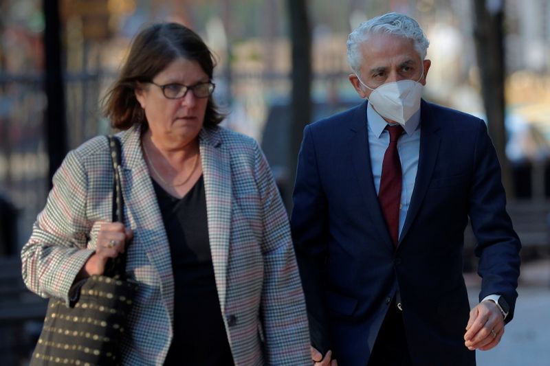 &copy; Reuters. Homayoun Zadeh (R), an associate professor of dentistry at the University of Southern California, arrives at federal court for to be sentenced after pleading guilty to a tax offense stemming from his role in a U.S. college admissions scandal, in Boston, M