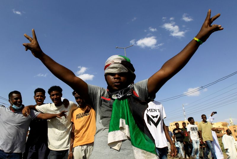 &copy; Reuters. FILE PHOTO: A protester gestures as people demonstrate against the Sudanese military's recent seizure of power and ousting of the civilian government, in the capital Khartoum, Sudan October 30, 2021. REUTERS/Mohamed Nureldin