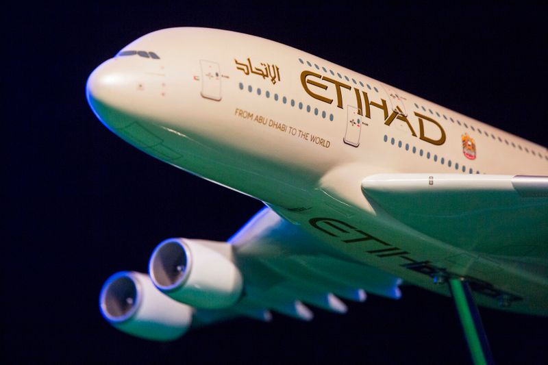 &copy; Reuters. FILE PHOTO: A model Etihad Airways plane is seen on stage before the unveiling of the new home jersey for the New York City Football Club in New York November 13, 2014.  REUTERS/Lucas Jackson 