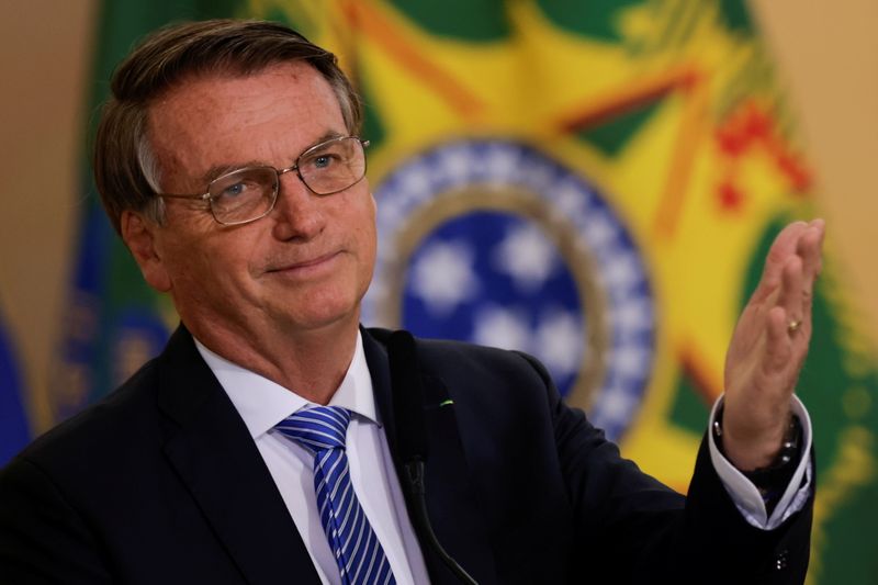 &copy; Reuters. FILE PHOTO: Brazil's President Jair Bolsonaro gestures during the launching of the program Brasil Fraterno, at the Planalto Palace in Brasilia, Brazil, November 11, 2021. REUTERS/Ueslei Marcelino