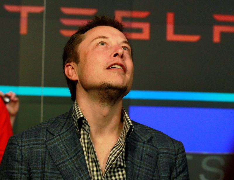 &copy; Reuters. FILE PHOTO: CEO of Tesla Motors Elon Musk reacts following the company's initial public offering at the NASDAQ market in New York June 29, 2010. REUTERS/Brendan McDermid//File Photo