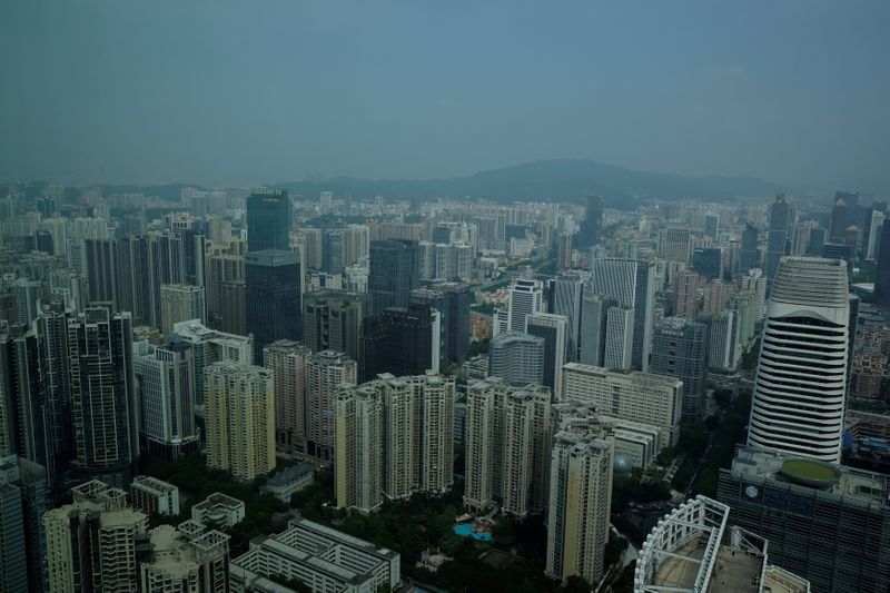 &copy; Reuters. FILE PHOTO: Residential and commercial buildings are located in downtown Guangzhou, China October 7, 2017. Picture taken October 7, 2017.  REUTERS/Bobby Yip