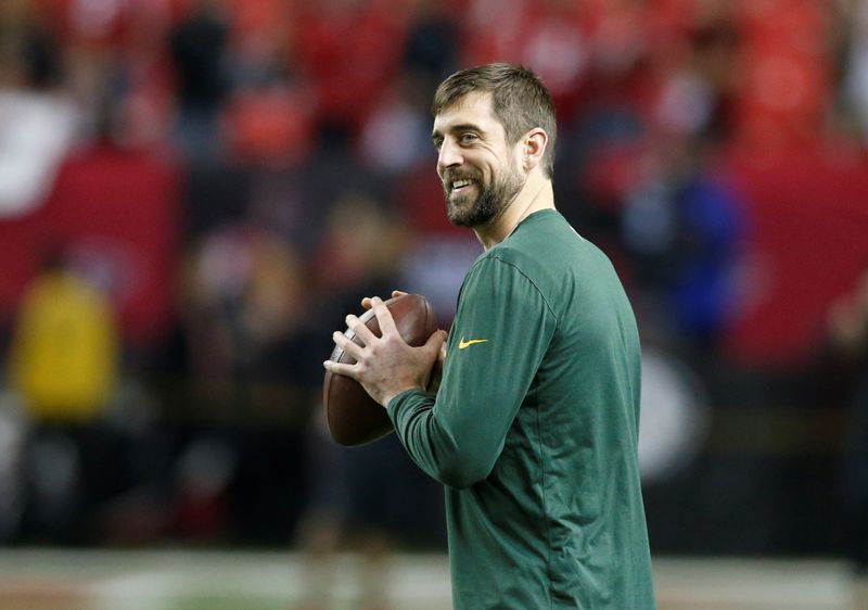 NFL-Packers QB Rodgers 'a little misty' upon return from 10-day absence