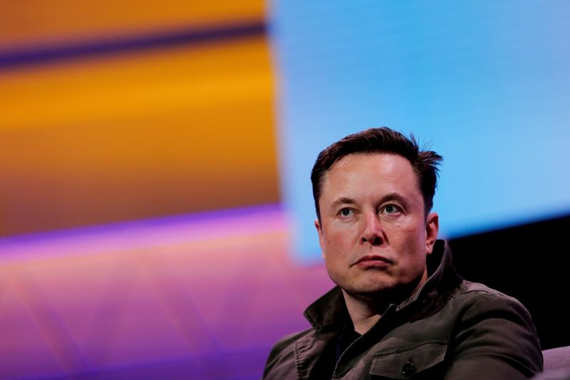 Elon Musk clashes with Bernie Sanders, offers to sell more Tesla stock