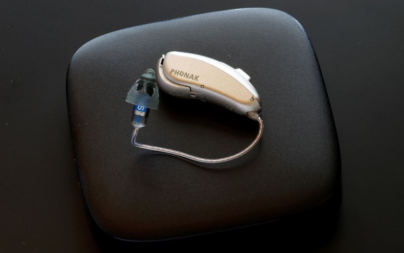&copy; Reuters. FILE PHOTO: A Phonak Audeo B-Direct hearing aid of Swiss manufacturer Sonova lies on a Phonak TV Connector device in Staefa, Switzerland August 16, 2017. REUTERS/Arnd Wiegmann