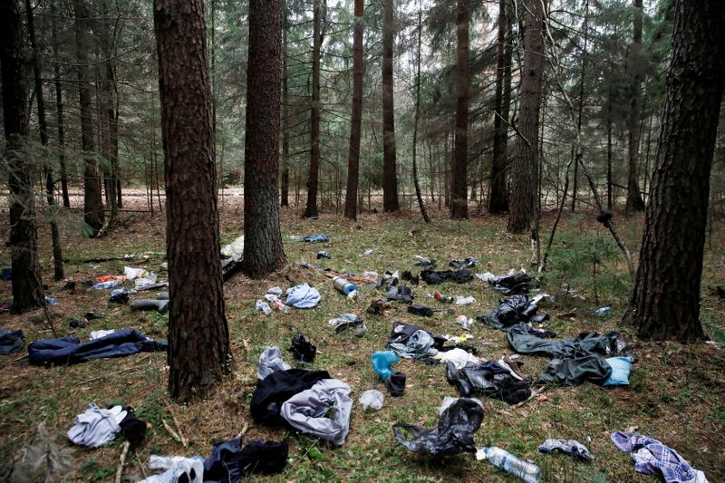 &copy; Reuters. Belongings of migrants are pictured in the forest during the migrant crisis near the Belarusian-Polish border in Hajnowka, Poland, October 28, 2021. Picture taken October 28, 2021. REUTERS/Kacper Pempel/File Photo