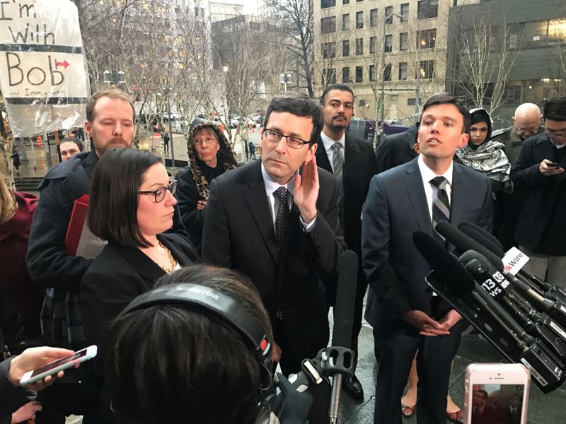 &copy; Reuters. FILE PHOTO: Washington state's attorney general Bob Ferguson (C) speaks to the media next to Washington state solicitor general Noah Purcell (R) outside the U.S. federal courthouse in downtown Seattle February 3, 2017. REUTERS/Dan Levine