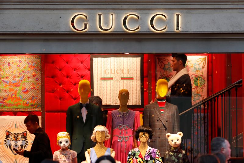 &copy; Reuters. FILE PHOTO: A Gucci sign is seen outside a shop in Paris, France, December 18, 2017. REUTERS/Charles Platiau