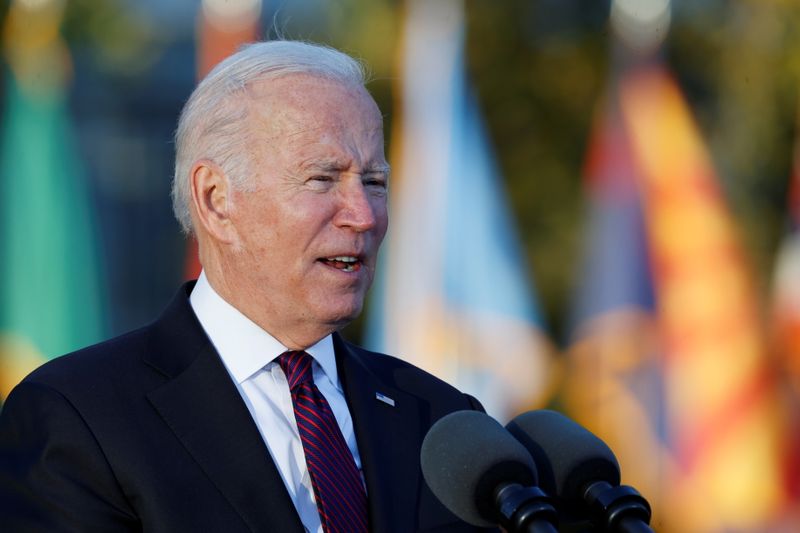 On a New Hampshire bridge, Biden bets infrastructure beats political headwinds