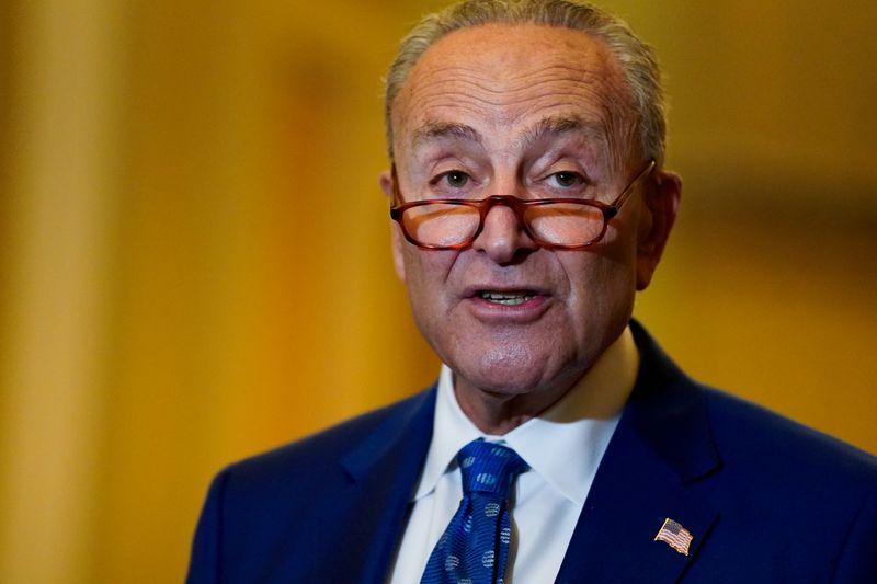 &copy; Reuters. FILE PHOTO: U.S. Senate Majority Leader Chuck Schumer (D-NY) speaks to reporters following the Senate Democrats weekly policy lunch at the U.S. Capitol in Washington, U.S., November 16, 2021. REUTERS/Elizabeth Frantz/File Photo