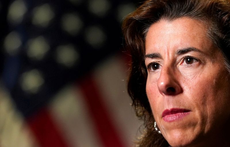 © Reuters. FILE PHOTO: U.S. Commerce Secretary Gina Raimondo listens to a question during an interview with Reuters at the Department of Commerce in Washington U.S., September 23, 2021. REUTERS/Kevin Lamarque/File Photo