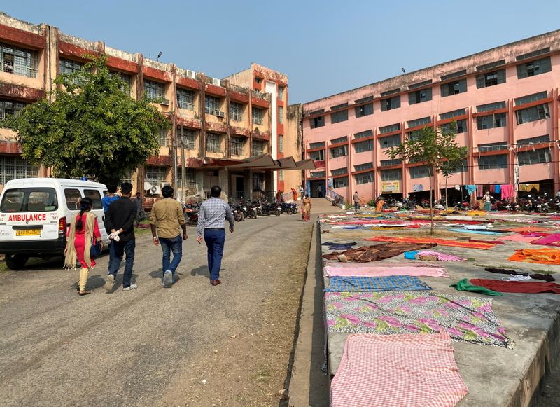 &copy; Reuters. Doctors walk towards the main building of the Jawaharlal Nehru Medical College and Hospital in Bhagalpur district in the eastern state of Bihar, India, November 12, 2021. Picture taken November 12, 2021. REUTERS/Krishna N. Das