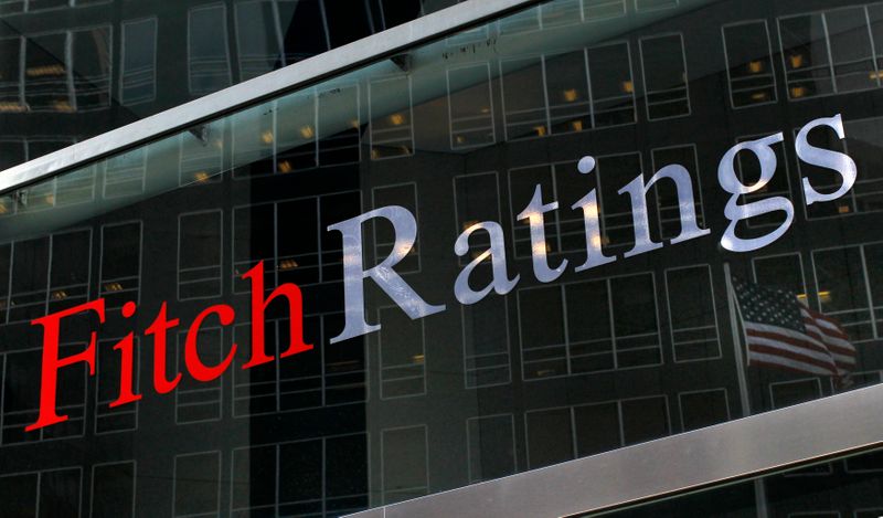 &copy; Reuters. Reflexo de uma bandeira dos EUA na fachada da sede da Fitch Ratings em Nova York, EUA
06/02/2013
REUTERS/Brendan McDermid