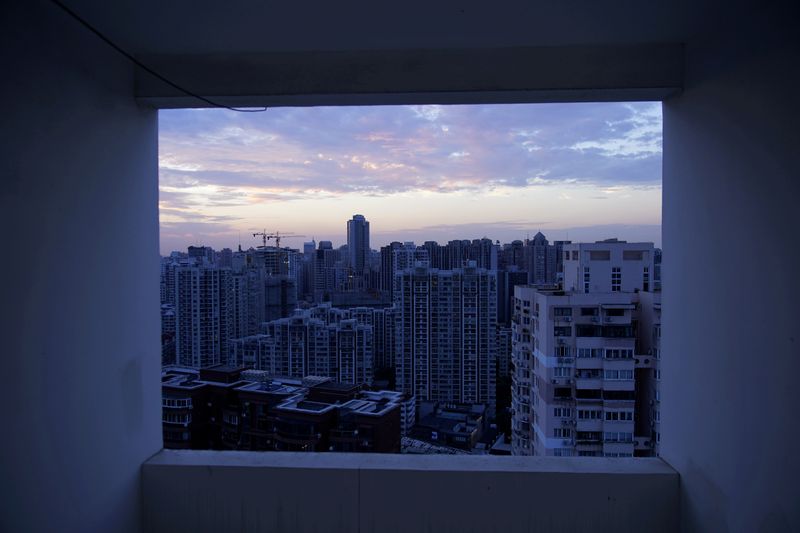 &copy; Reuters. FILE PHOTO: Buildings of residential compounds are seen in Shanghai, China August 11, 2020. REUTERS/Aly Song/File Photo