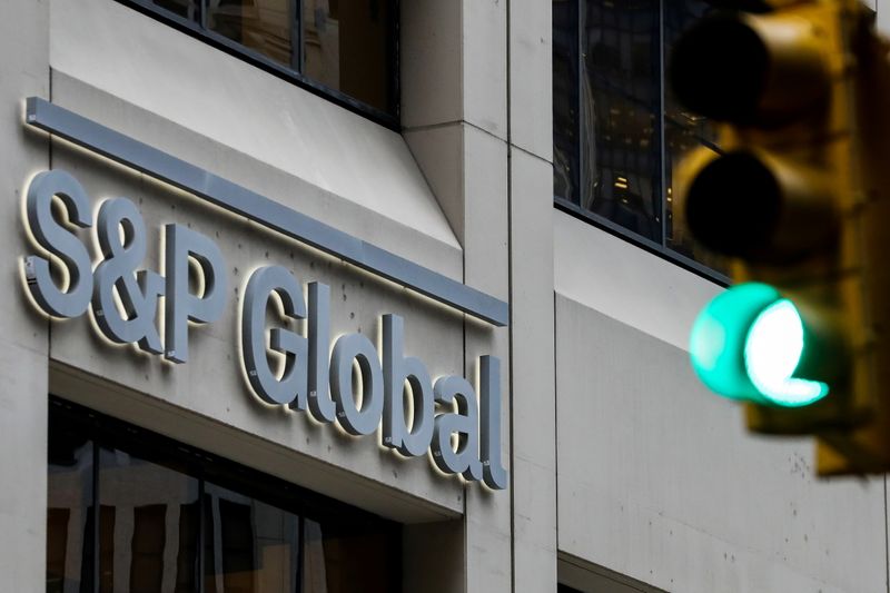 &copy; Reuters. FILE PHOTO: The S&P Global logo is displayed on its offices in the financial district in New York City, U.S., December 13, 2018. REUTERS/Brendan McDermid/File Photo
