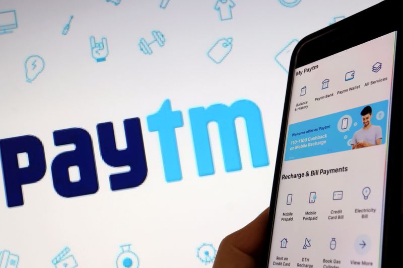 &copy; Reuters. FILE PHOTO: The interface of Indian payments app Paytm is seen in front of its logo displayed in this illustration picture taken July 7, 2021. REUTERS/Florence Lo/Illustration