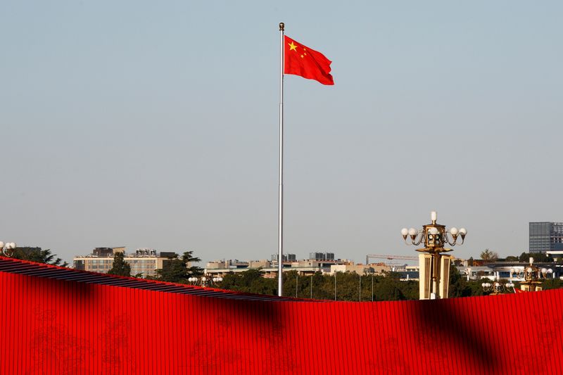 © Reuters. FILE PHOTO: A Chinese flag flutters at the Tiananmen Square in Beijing, China October 25, 2019.  REUTERS/Florence Lo