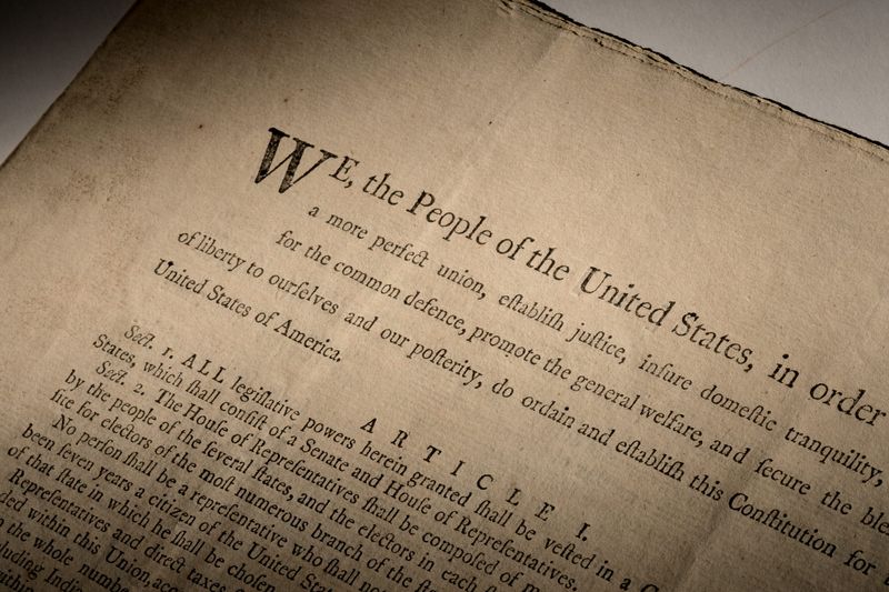 &copy; Reuters. An extremely rare official first-edition printed copy of the U.S. Constitution as adopted by delegates to the Constitutional Convention in Philadelphia in 1787, which will auctioned off in mid-November 2021 by Sotheby’s in New York, is seen in this hand