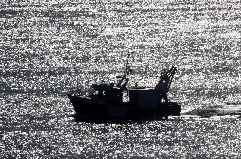 &copy; Reuters. FILE PHOTO: A trawler sails off the fishing port in Granville, France, November 3, 2021. REUTERS/Stephane Mahe