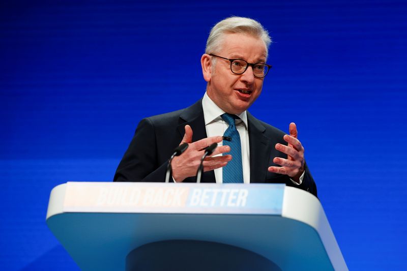 &copy; Reuters. FILE PHOTO: Britain's Housing Secretary Michael Gove delivers a speech during the annual Conservative Party conference, in Manchester, Britain, October 4, 2021. REUTERS/Phil Noble