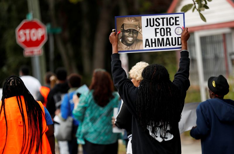 &copy; Reuters. FILE PHOTO: People march demanding justice for Ahmaud Arbery in Brunswick, Georgia, November 4, 2021. REUTERS/Octavio Jones/File Photo