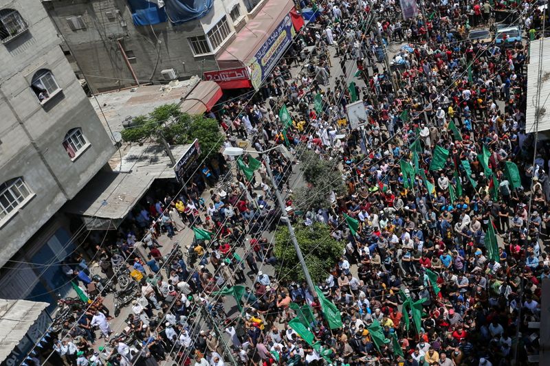 &copy; Reuters. Apoiadores do Hamas comemoram nas ruas de Gaza após trégua no conflito com Israel
21/05/2021
REUTERS/Ibraheem Abu Mustafa