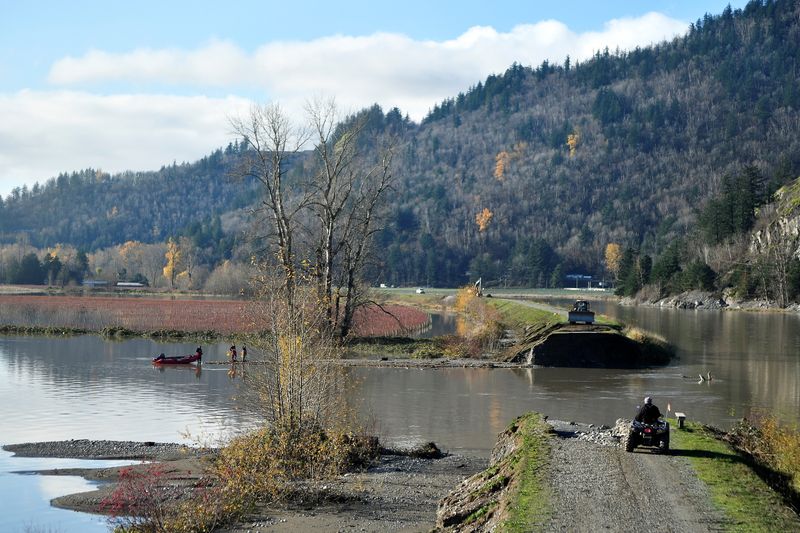 &copy; Reuters. A broken dike is seen after rainstorms lashed the western Canadian province of British Columbia, triggering landslides and floods, shutting highways, in Abbottsford, British Columbia, Canada November 19, 2021.  REUTERS/Jennifer Gauthier