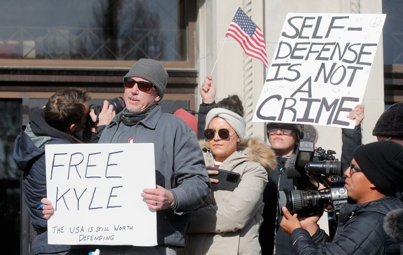 &copy; Reuters. People await the verdict in the trial of Kyle Rittenhouse, outside the Kenosha County Courthouse in Kenosha, Wisconsin, U.S., November 19, 2021. REUTERS/Brendan McDermid