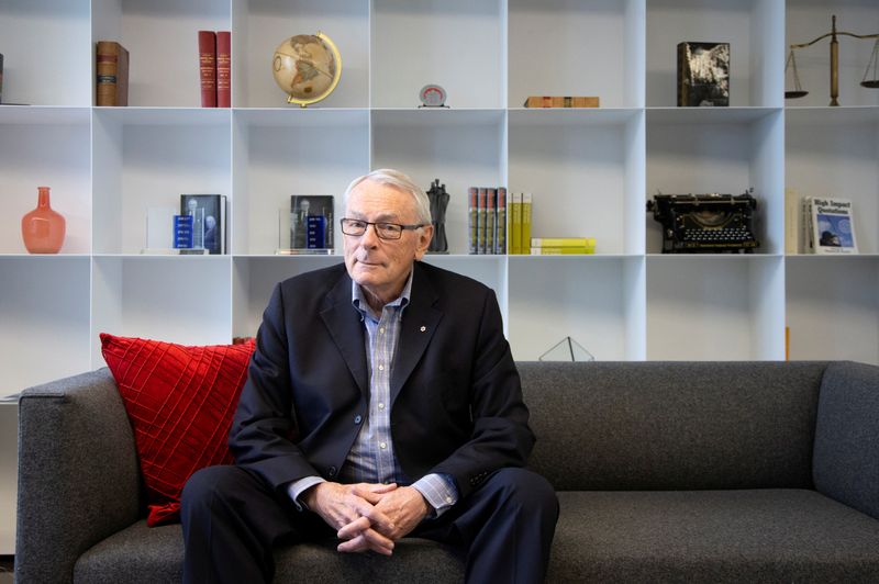 &copy; Reuters. FILE PHOTO: International Olympic Committee (IOC) member Dick Pound, poses in his offices in Montreal, Quebec, Canada February 26, 2020.  REUTERS/Christinne Muschi/File Photo